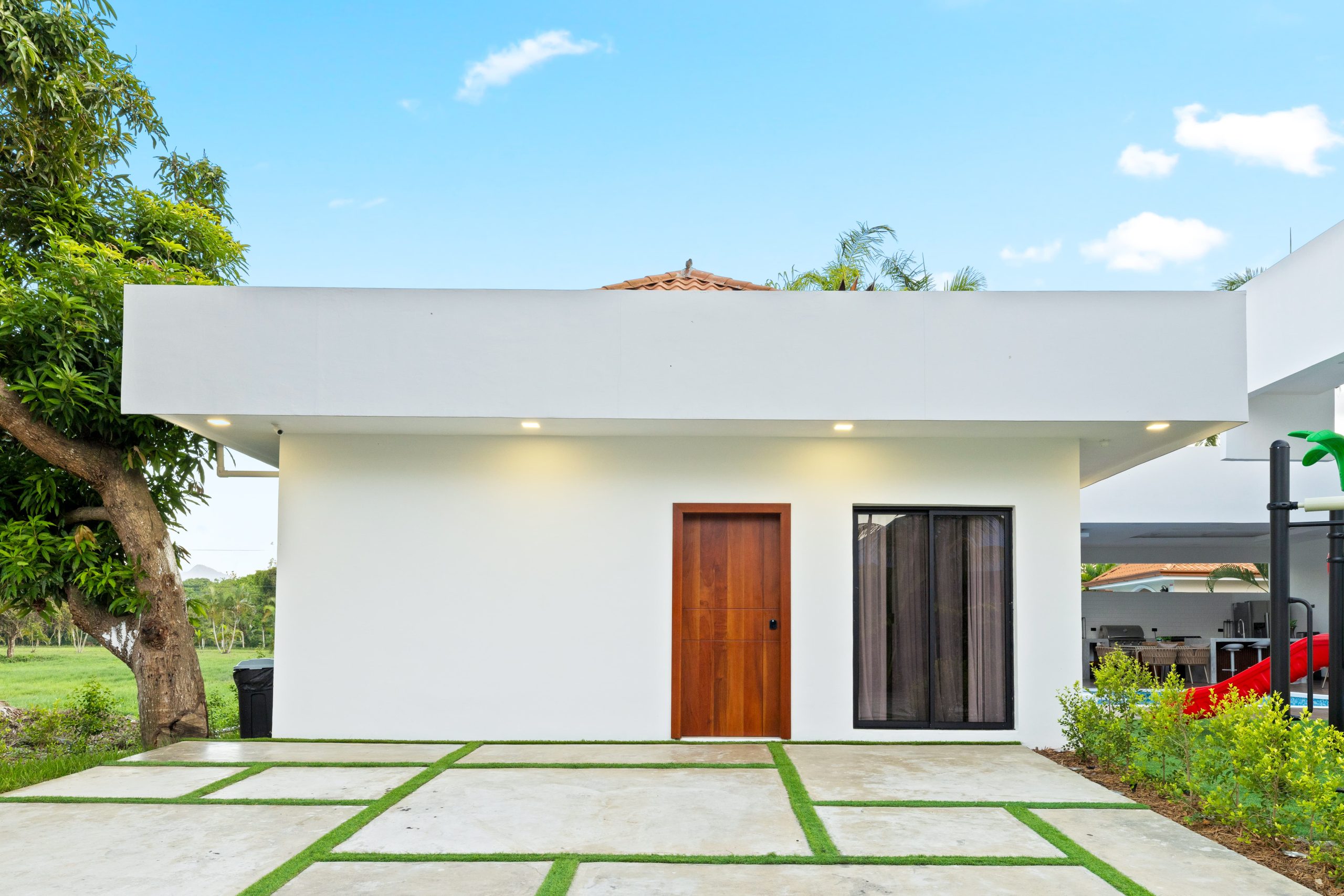 contemporary-house-facade-with-garden-courtyard-by-2026-03-18-16-13-39-utc